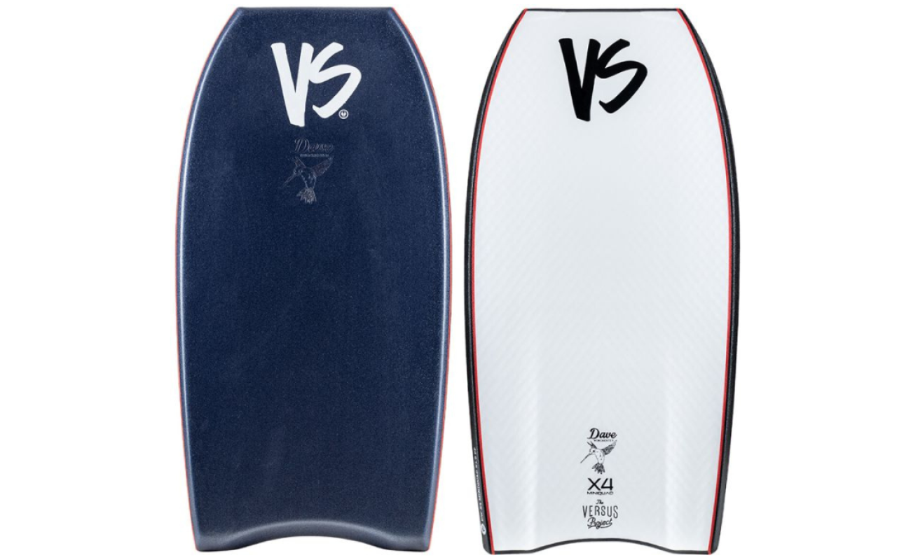Two bodyboards side by side, left dark navy with white "VS" logo, right white with black "VS" logo and red-black rails